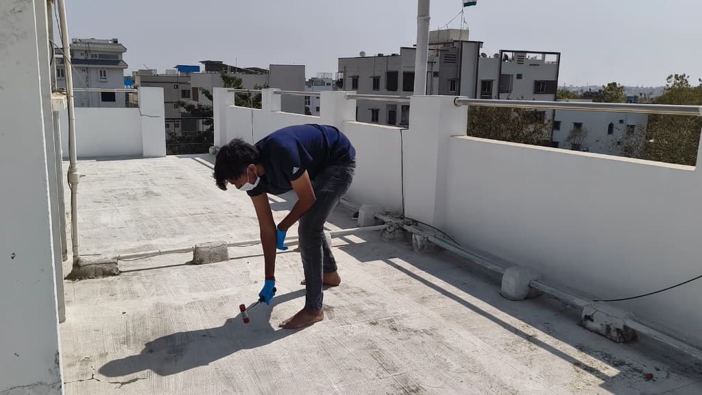 Cyond engineer performing terrace water leakage inspection in Hyderabad